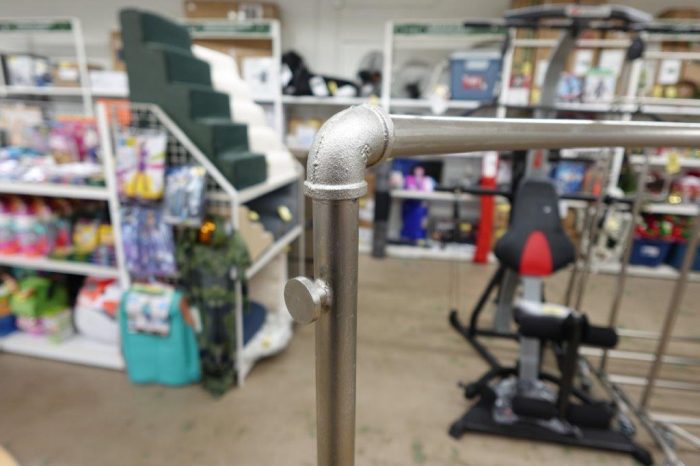 Curved Industrial Clothing Rack Store Display - Image 6